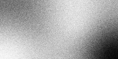 Abstract monochrome halftone texture for background or overlay. Vector black and white halftone texture, transitioning smoothly from dark to light with a dense arrangement of dots. Design concept 
