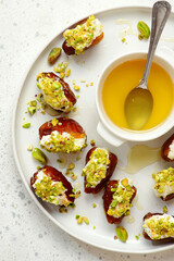 Honey Pistachio Ricotta stuffed Dates.selective focus