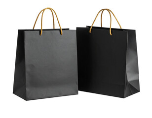  Floating Matte Black Shopping Bags with Gold Rope Handles, Dynamic Composition, Isolated PNG