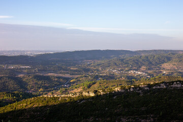 Serene Valley Surrounded by Green Hills