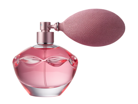 A vintage-style pink glass perfume bottle with an atomizer bulb sits isolated on a white background, evoking classic beauty and fragrance.