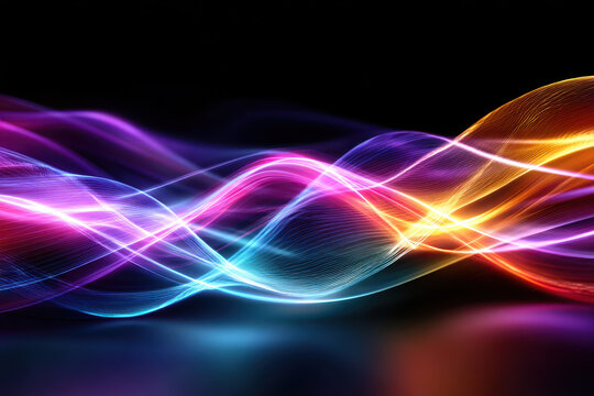 Vibrant light waves create mesmerizing patterns in darkness with moving colors