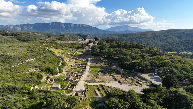Aerial drone photo of iconic archaeological site of former hillside city of Kameiros, overlooked by the columns of an acropolis dedicated to Athena, Rhodes island, Dodecanese, Greece