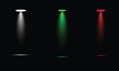 Three stage spotlights: white, green, red, illuminating dark