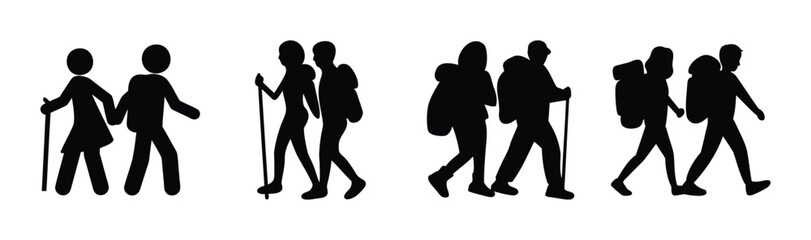 Hiking couples silhouettes walking with poles and backpacks