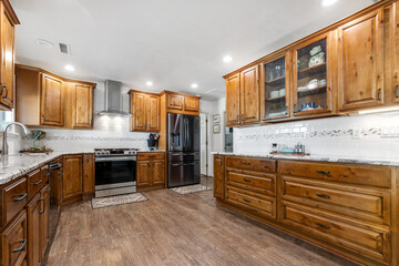 Modern Kitchen with Rustic Wood Cabinets and Sleek Appliances