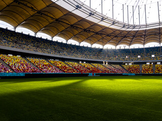 Massive Soccer Stadium Filled. Wide view of empty stadium. Green grass on a sport Arena. Empty Football Soccer Stadium Tribune. National arena with empty seats. Sport event on National Arena.  © Epic Vision