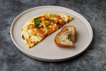 Delicious Cheese Omelette On Plate With Toast