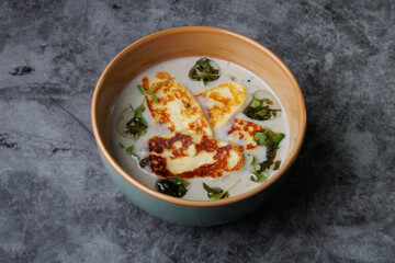 Creamy Cheese Soup, Garnished with Herbs and Melted Cheese