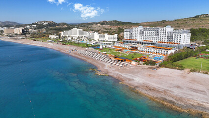 Aerial drone photo of beautiful sandy beach of Kalithea in the west coast of Rhodes island well known for luxury hotels and resorts, Dodecanese, Greece
