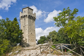 The square stone structure of Terza Torre (Montale) fortress on a rocky outcrop in San Marino. © Marcel