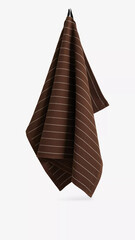 Brown kitchen towel hanging on a hook in a modern kitchen setting during the day.