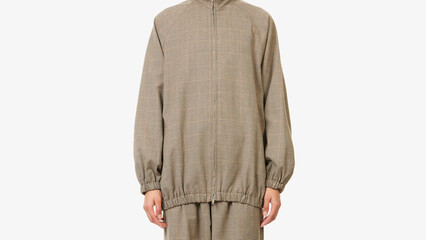 Fashionable lightweight jacket and matching pants worn by a model in a studio setting for a clothing brand showcase.