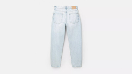 Light blue high-waisted jeans displayed flat against a neutral background showcasing a casual style for any occasion.
