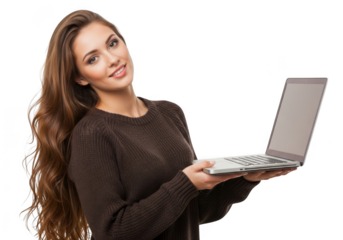 Smiling young woman with long brown hair wearing a dark sweater holds a silver laptop against a black background looking at the camera