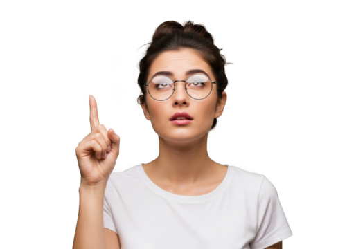 A young woman wearing glasses and a white t shirt points her finger upward against a black background suggesting an idea or revelation