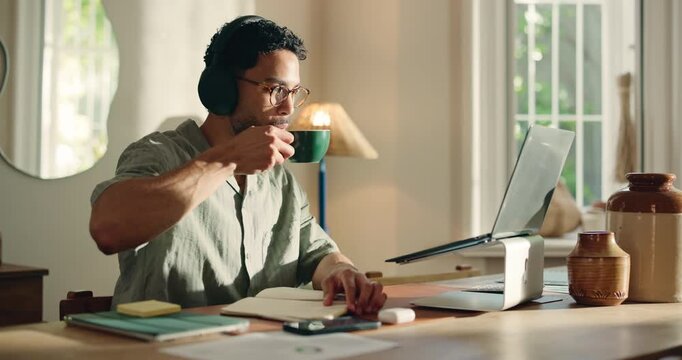 Home, drinking coffee and man with laptop, video call and headphones with copywriting. Person, freelancer or journalist with caffeine, remote work and online interview with communication and notebook