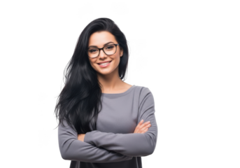 A confident young woman with long dark hair and glasses smiles with arms crossed against a black background