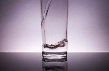 Water glass on white background