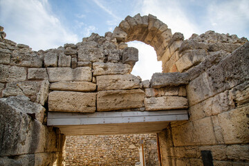 Ruins of a house with a stone arch and a ceiling on a clear sunny day, Chersonesos. Sights of Russia. Architecture of World tourism. © Victor1153