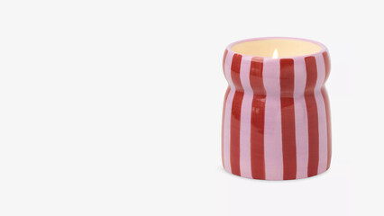 Unique striped candle holder designed for cozy atmosphere in home decor.