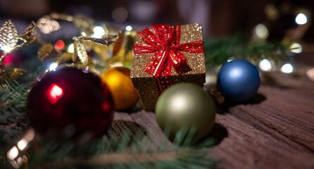 Golden Christmas Gift Box with Baubles and Festive Decorations