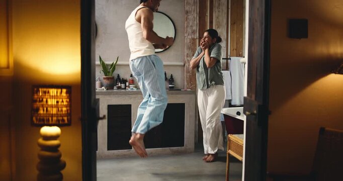 Excited couple, pregnancy test and bathroom with positive results for parenthood, start or growth. Man, woman or happy lovers with smile, hug or celebration for maternity stick, news or begin family