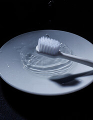 A white toothbrush with splash 