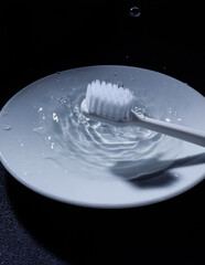 white toothbrush on black background