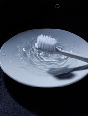 white toothbrush with water