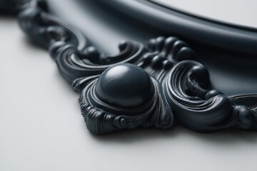 Black baroque frame detail, ornate decorative carving with rich scrollwork and convex elements on a light grey background. Luxurious architectural molding, elegant vintage ornament.