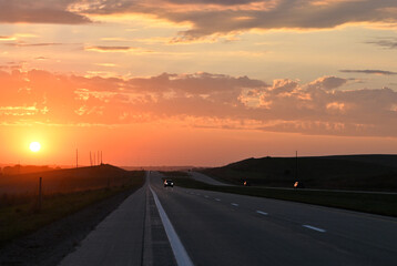 Setting Sun and Rural Highway