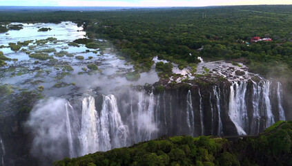 Fototapeta premium Majestic Victoria Falls with lush green rainforest