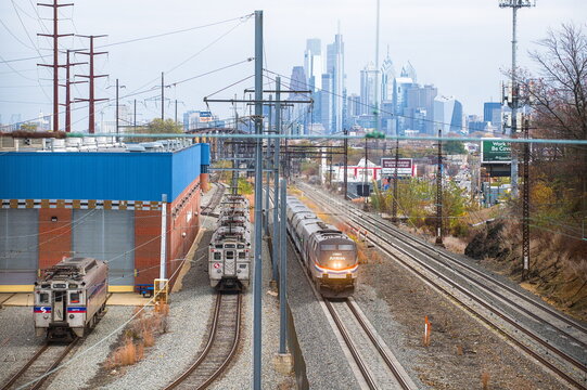 Amtrak train passing SEPTA Overbrook Maintainance facility in Philadelphia PA