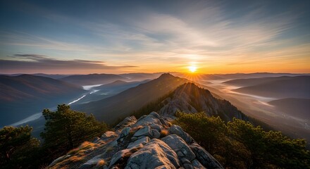 Stunning mountain sunrise with vibrant golden light streaming across the landscape, perfect for travel and adventure promotions, inspirational content