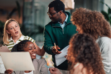 Diverse business team collaborating during office meeting