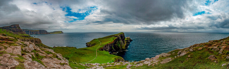 Scotland, United Kingdom: aerial view of the sheer cliff of Neist Point lighthouse (1909), famous promontory and viewpoint on the most westerly point on the Duirinish peninsula on the Isle of Skye 