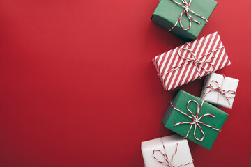 Gift boxes on color background, flat lay, space for text