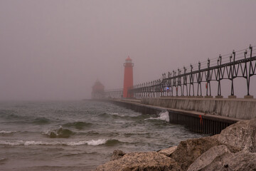 Breakwater on a foogy morning.  South Pierhead, Grand Haven, Michigan, USA.