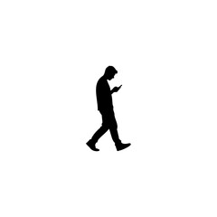 Modern silhouette of man walking while looking at phone for social media updates or communication