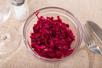 Salad made from boiled grated beetroot closeup