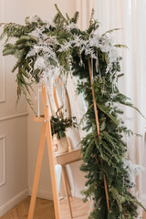 Christmas decorations on the mirror in the room