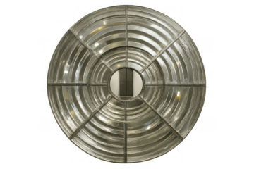 Fresnel lens showing concentric glass rings focusing light, an optical element on transparent background