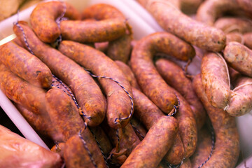 Store sells chorizo sausages, traditional appetizer and barbecue dish made from chopped pork meat, paprika, and spices..