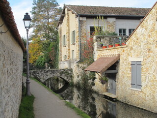 Fototapeta premium bridge over canal in old village
