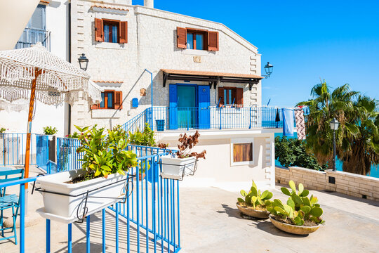 Charming Mediterranean house with blue doors and sea views in Vieste, Apulia, Italy