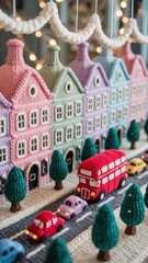 A knitted London city with beautiful colored buildings and cars whizzing along the road. A red double-decker bus, surrounded by knitted Christmas trees in the knitted snow.