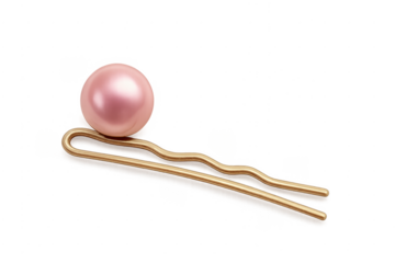 Golden bobby pin holding a decorative pink pearl