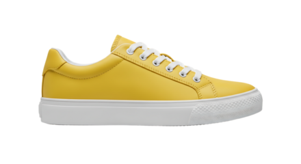 Bright yellow low-top sneaker, with white laces and white sole isolated on a white or transparent background, cutout, PNG