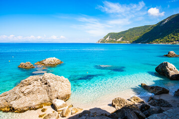 View of rocks in crystal clear turquoise sea on Agios Nikitas beach, Lefkada island, Greece